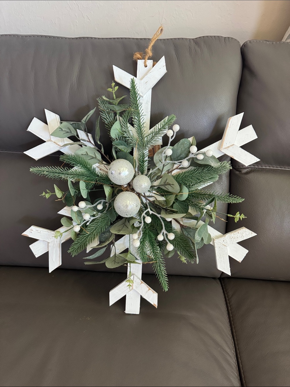 Festive White Snowflake Holiday Wall Wreath with Greenery and Lights